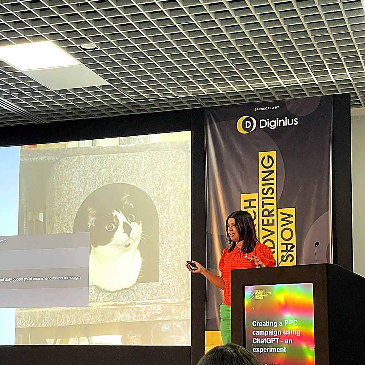 Farah speaking on stage (photo 5)